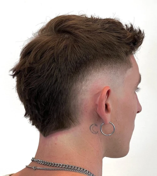 Edgy Short Mohawk with Clean Low Burst Fade