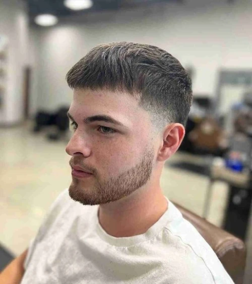 Faded Haircut with Short Fringe and Low Taper