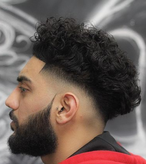 Long Curly Hair with Mid Skin Fade