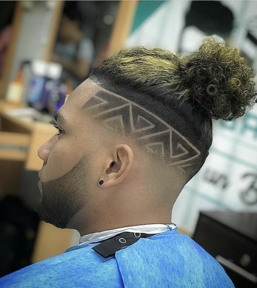 Man Bun with Undercut Fade and Artist Design